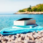 image of books at the beach